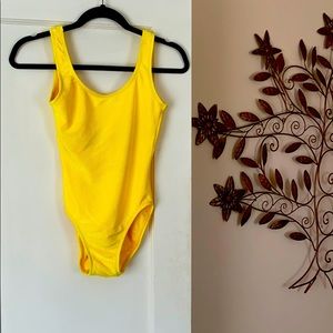 Sexy bright yellow bathing suit or bodysuit